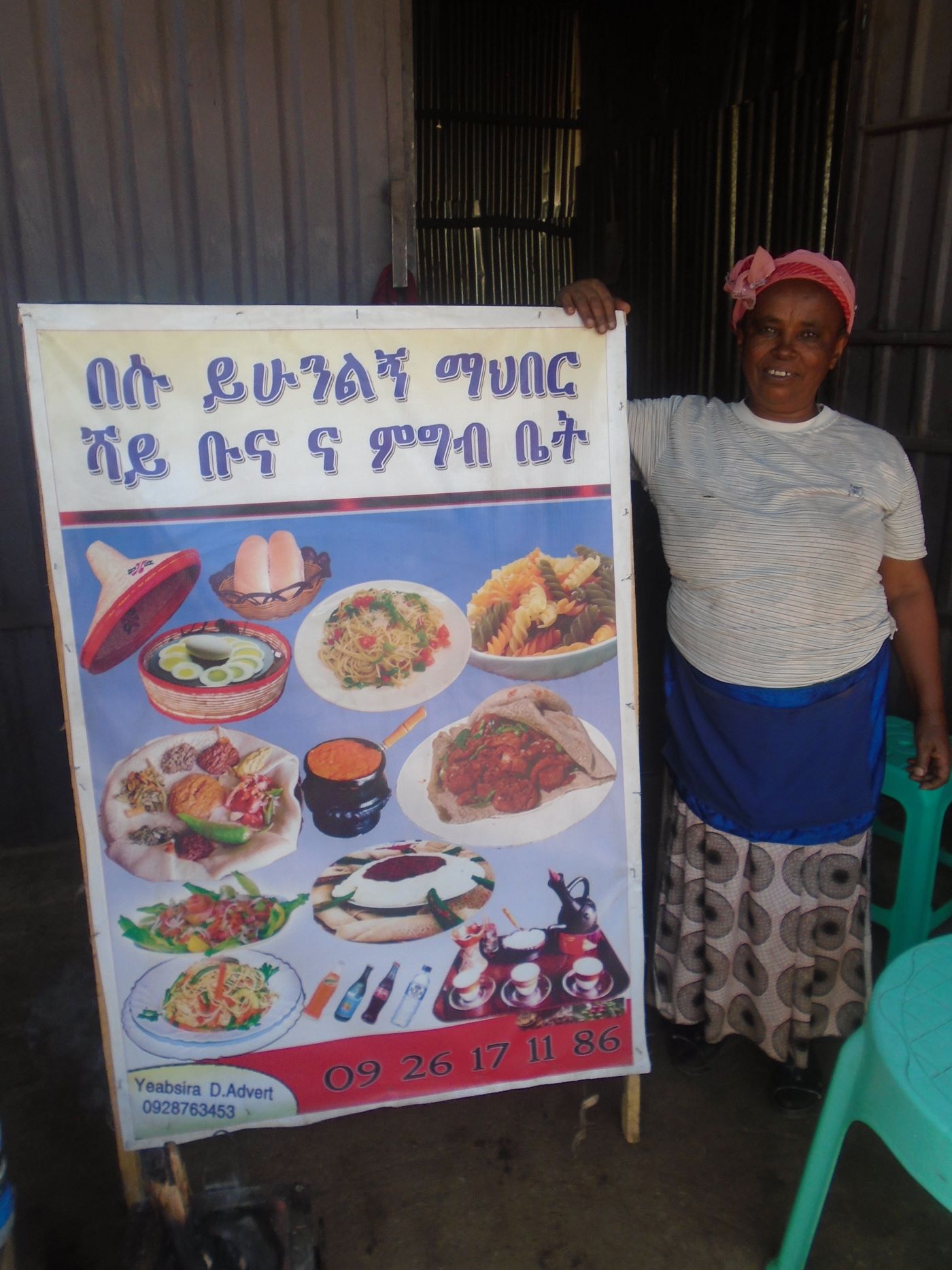 Zeweditu with her business poster 